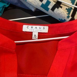 Burnt orange blouse with quarter sleeves buttoned